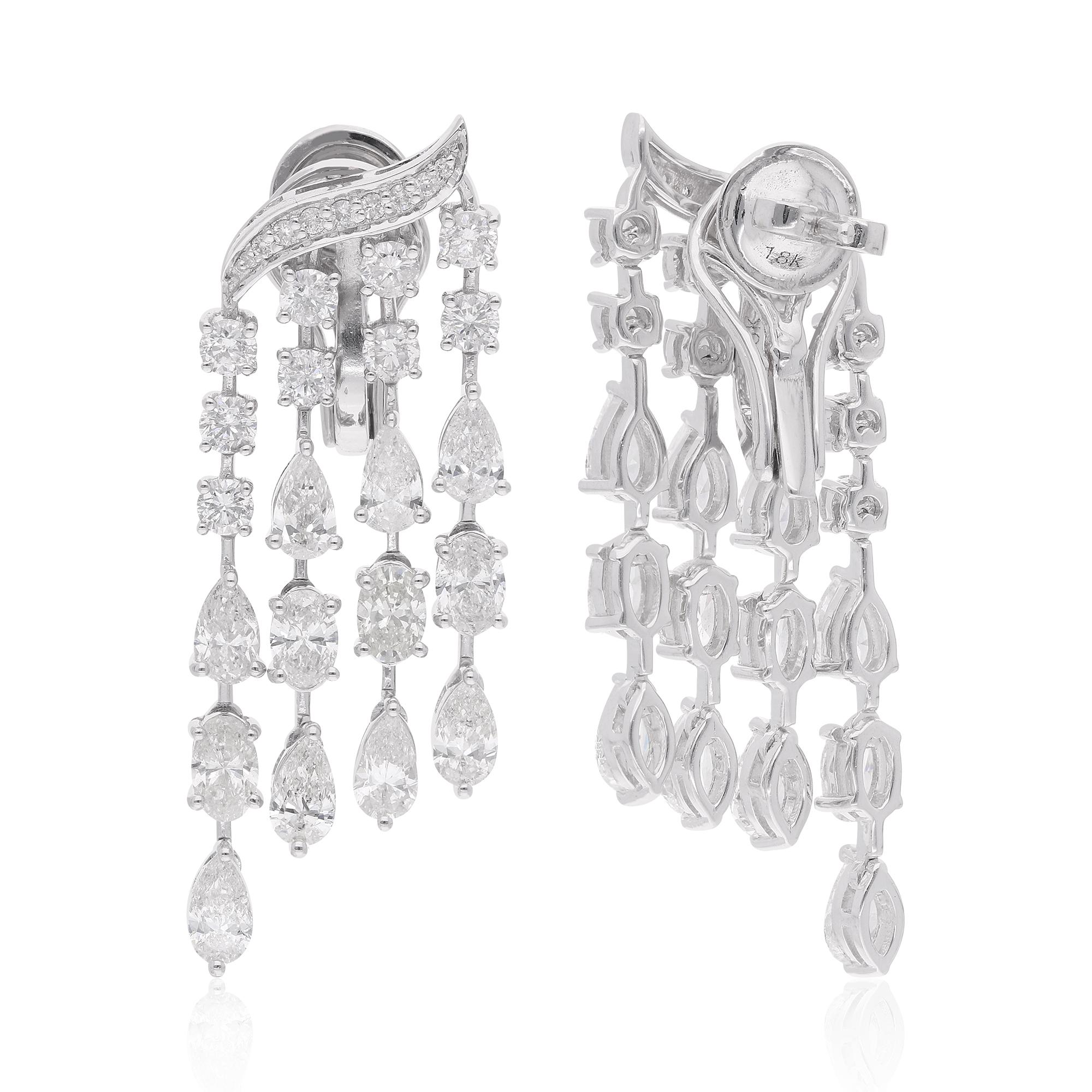 Chandelier earrings featuring pear, oval, and round diamonds in 18 karat white gold are a stunning and glamorous pair of fine jewelry. Each earring showcases a combination of pear-shaped, oval-shaped, and round diamonds.

Item Code :- SEE-14491A