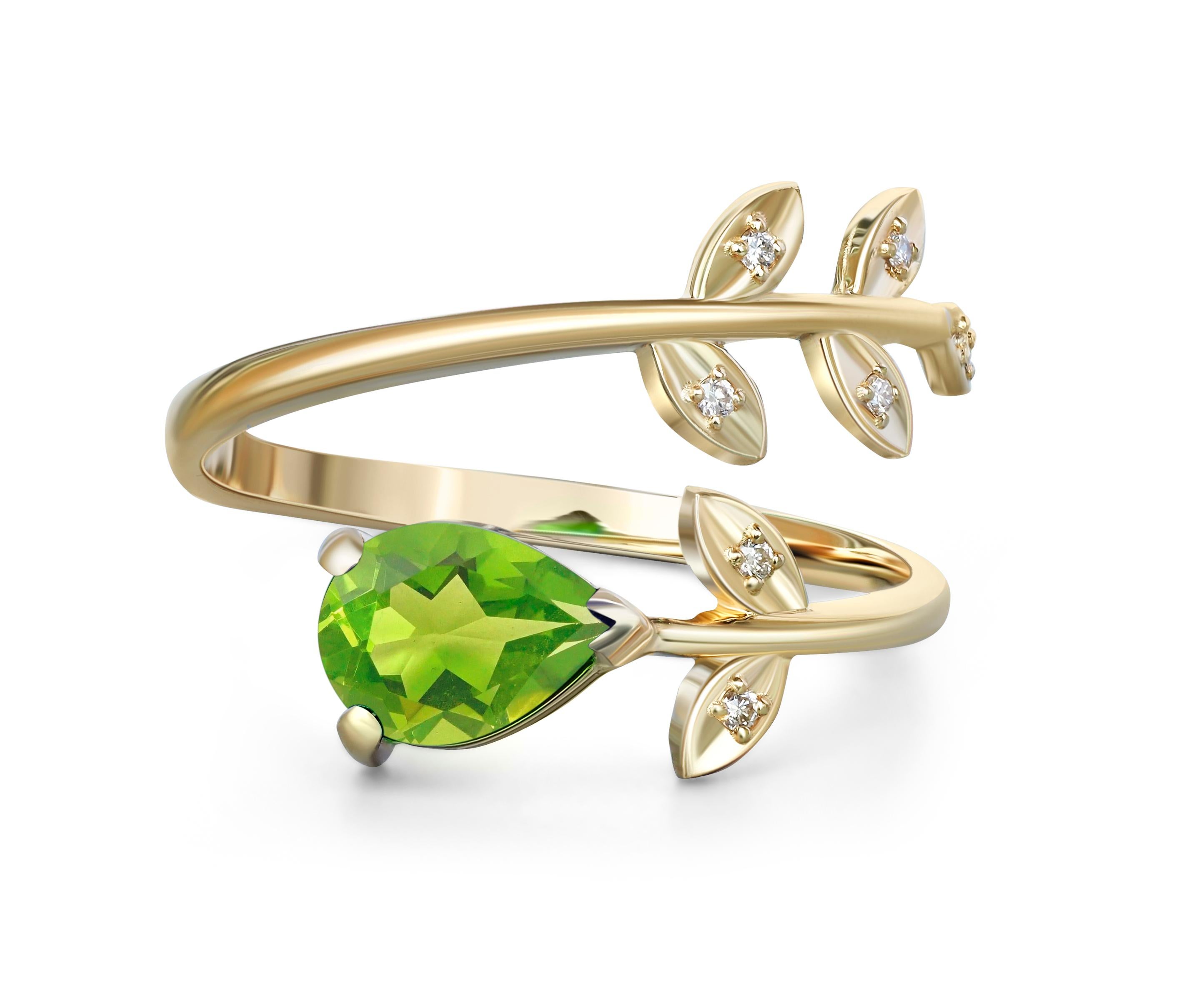 Pear Peridot 14k gold ring. 
Peridot gold ring. Genuine Peridot ring. Gold leaves ring. Peridot leaves ring. Floral gold ring.

Metal: 14 k gold
Weight: 2 g. depends from size.

Set with Peridot: pear shape, approx 0.8 ct, apple green 