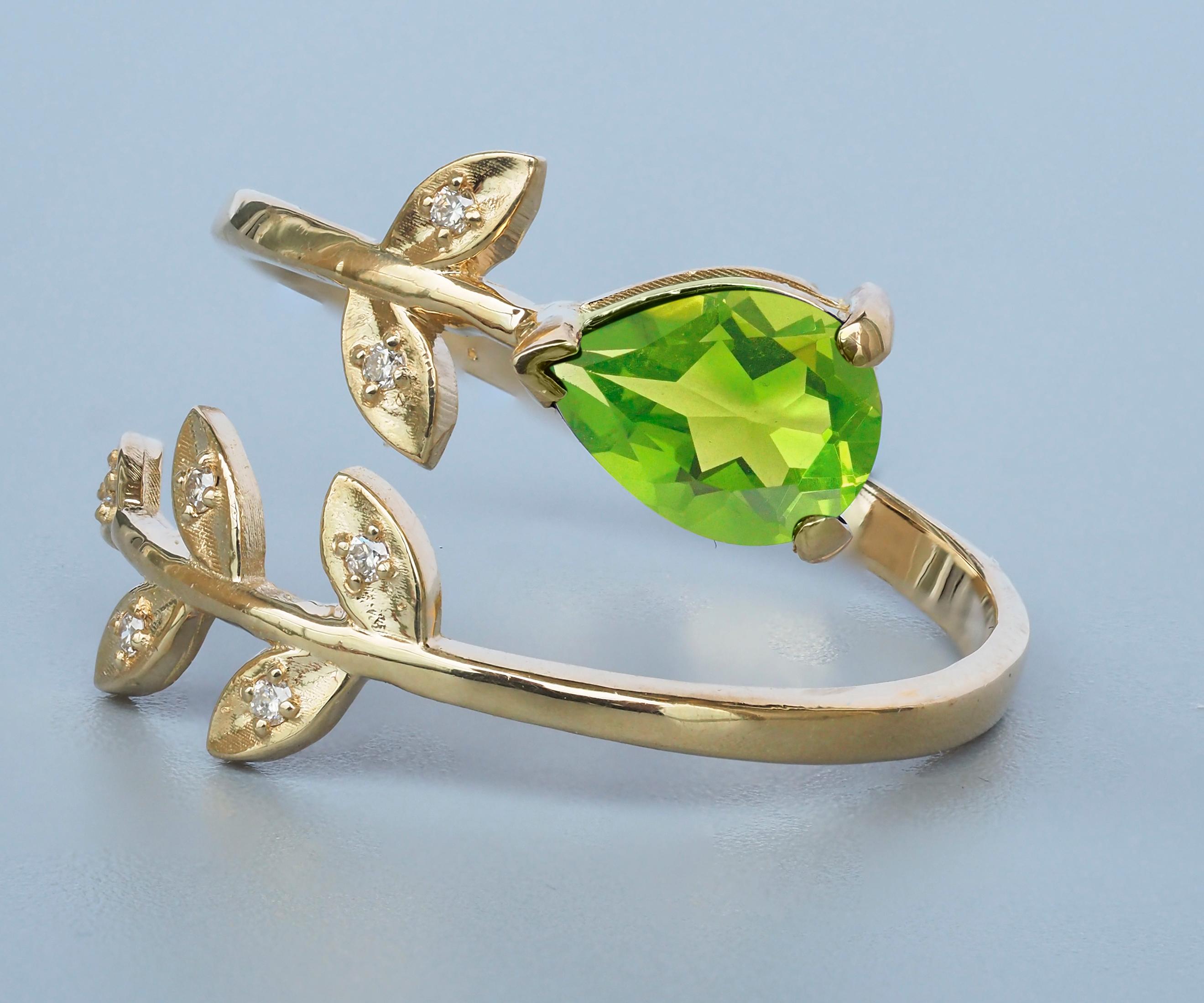Modern Pear Peridot 14k gold ring.  For Sale