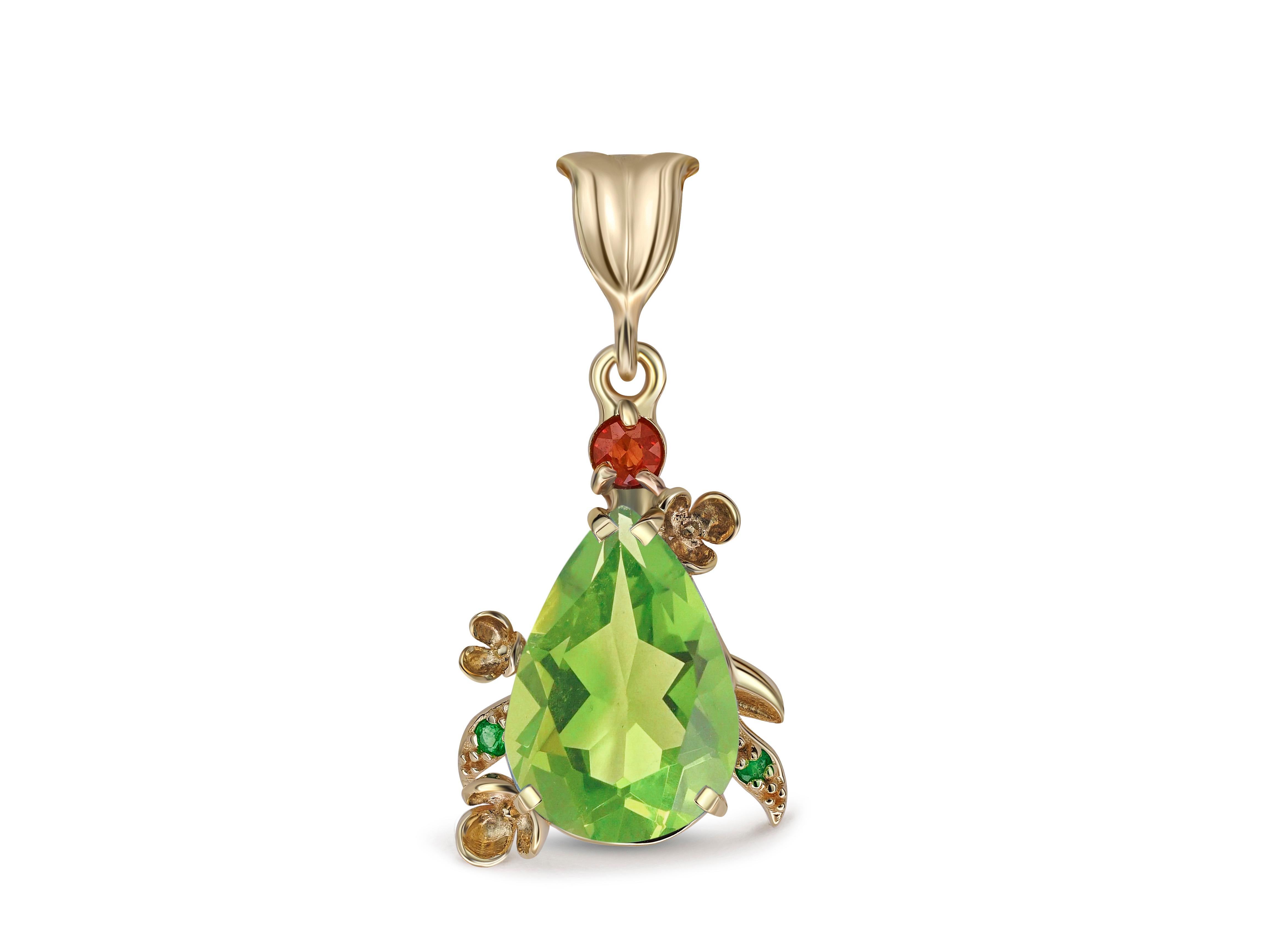 Pear Peridot Pendant in 14 Karat Gold. 
Flower design pendant with natural peridot. Peridot gold pendant. Apple color gemstone pendant.

Metal: 14k gold
Weight: 2.85 g.
Pendant size: 30x14.5 mm.

Set with peridot, 
Color - apple green
Pear cut, 2.5