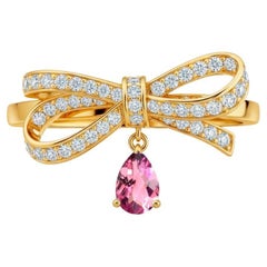 Pear pink tourmaline drop bow ring in 14k gold Pear pink tourmaline drop bow ring in 14k gold