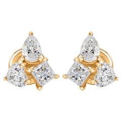 Orecchini a bottone con diamanti naturali taglio "pear" e "trillion" in oro giallo 14 carati