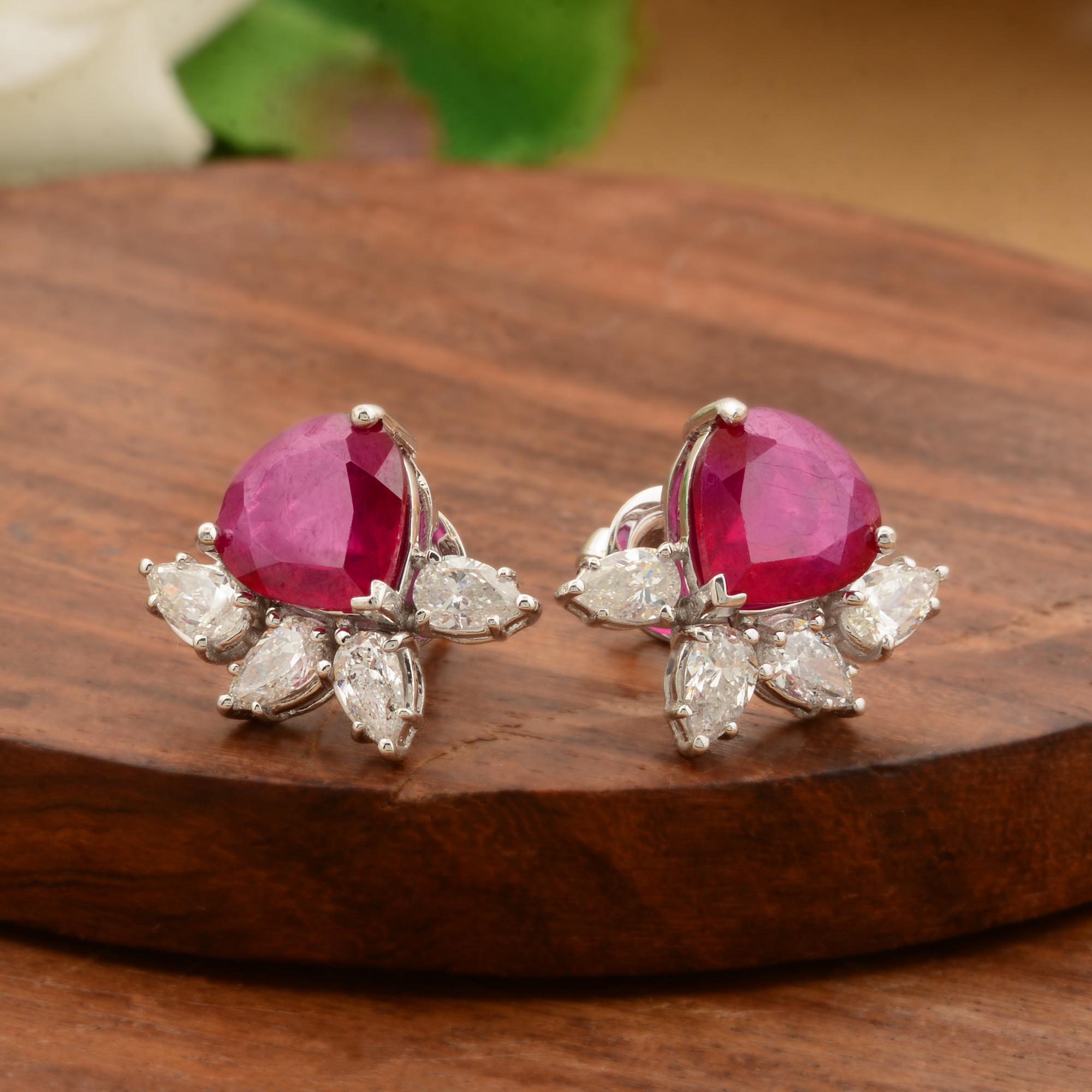 Cast from 14-karat gold, these exquisite earrings are handset with 5.95 carats red gemstone and 1.61 carats of sparkling diamonds.

FOLLOW SPECTRUM JEWELS storefront to view the latest collection & exclusive pieces. Spectrum Jewels is proudly rated