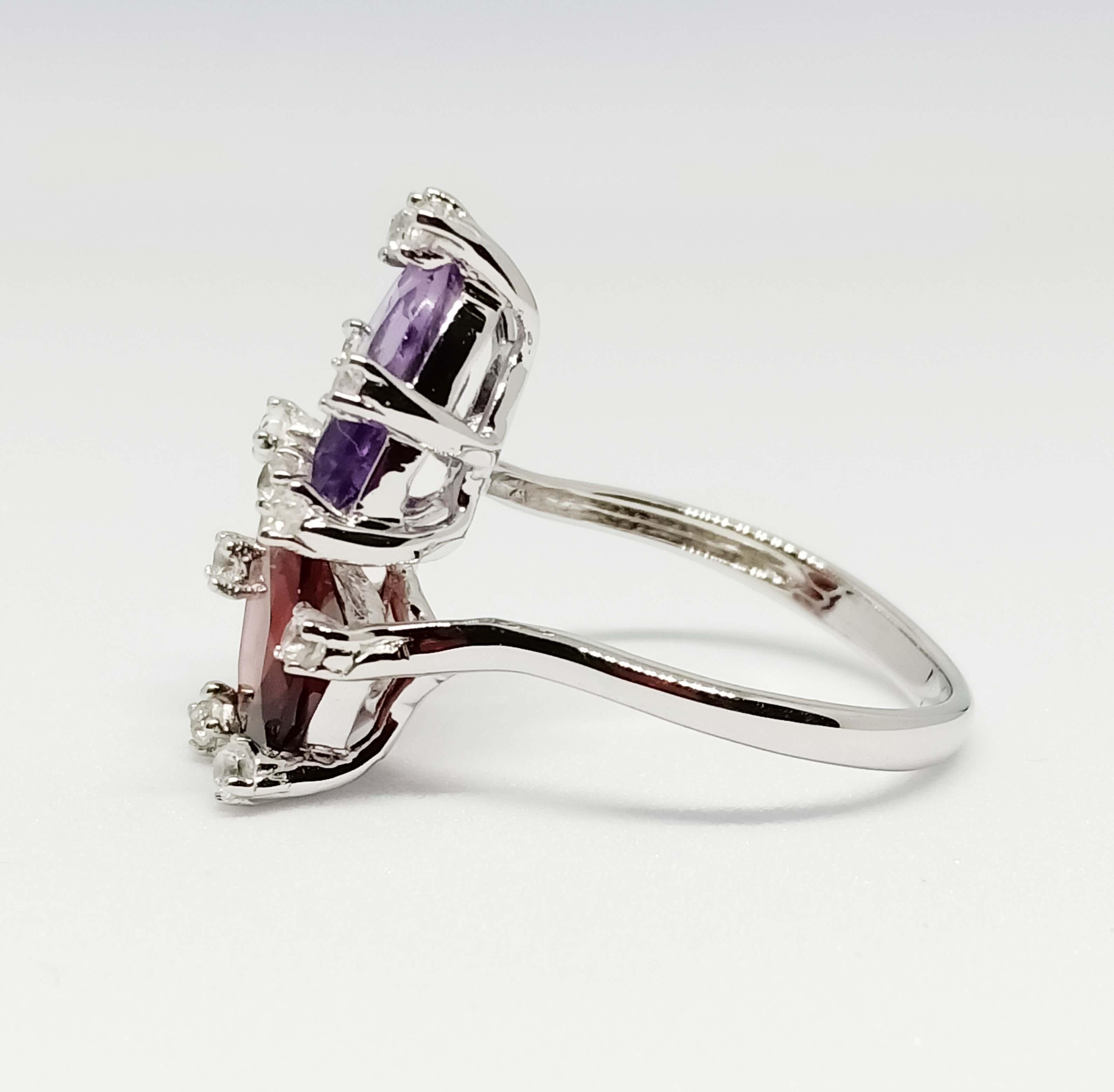 Pear Cut Pear ring.  Garnet and Amethyst with withs white zircon , Sterling silver For Sale