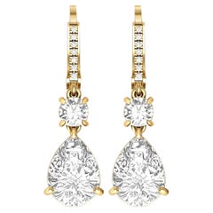 Boucles d'oreilles poire et moissanite taille ronde en or 14 vintage.
