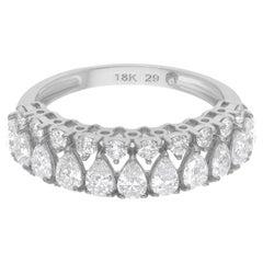 Halb-Eternity-Ring aus 14 Karat Weißgold mit birnenförmigem und rundem Diamanten