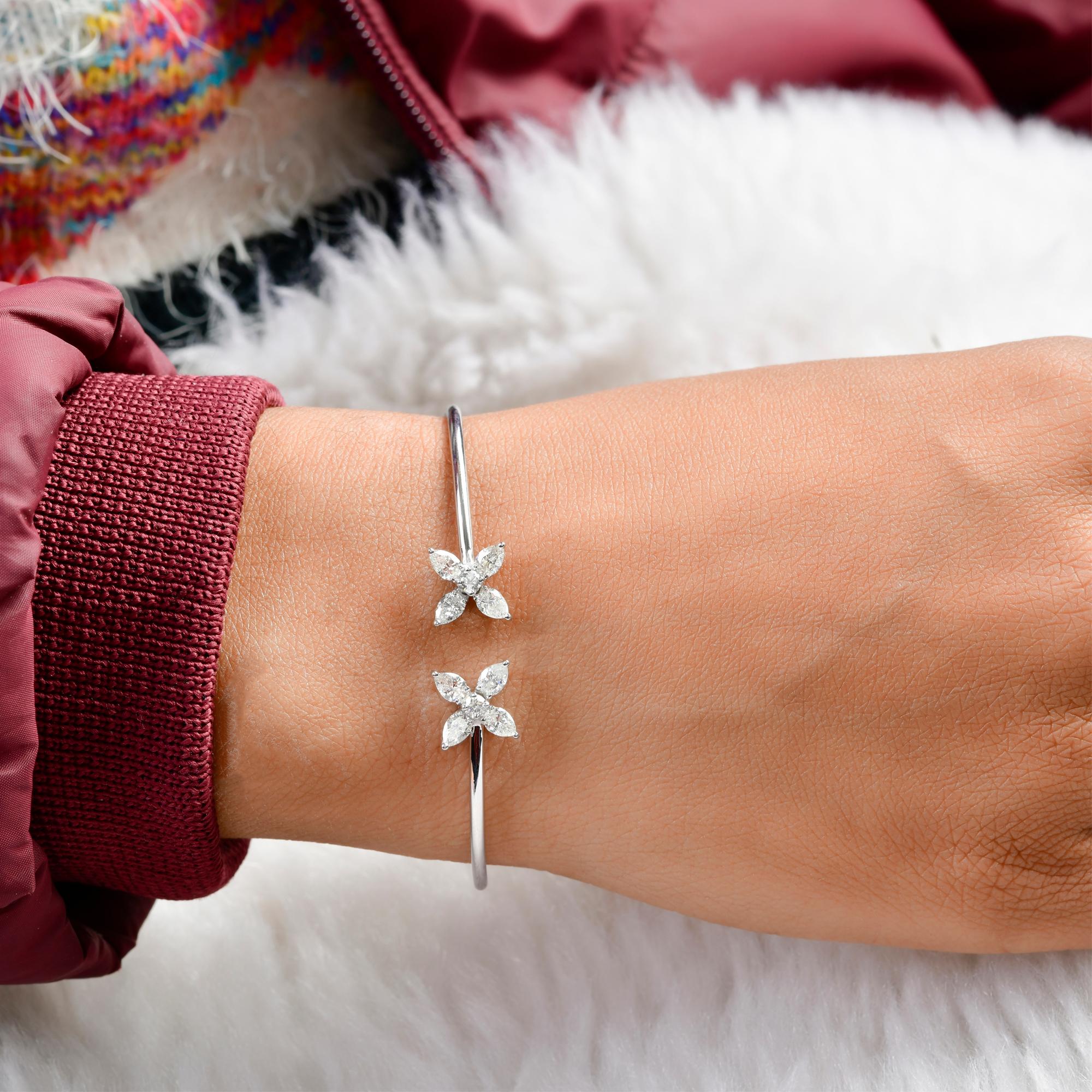 Pear Round SI/H 1.34Ct Natural Diamond Floral Open Cuff Bracelet 14k White Gold
The bracelet features two sparkling floral motifs, each delicately set with diamond creating a soft, radiant shimmer that catches the light beautifully. Each petal is