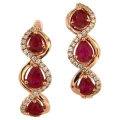 Pear Rubies and Diamond Swirl Earrings in 14K