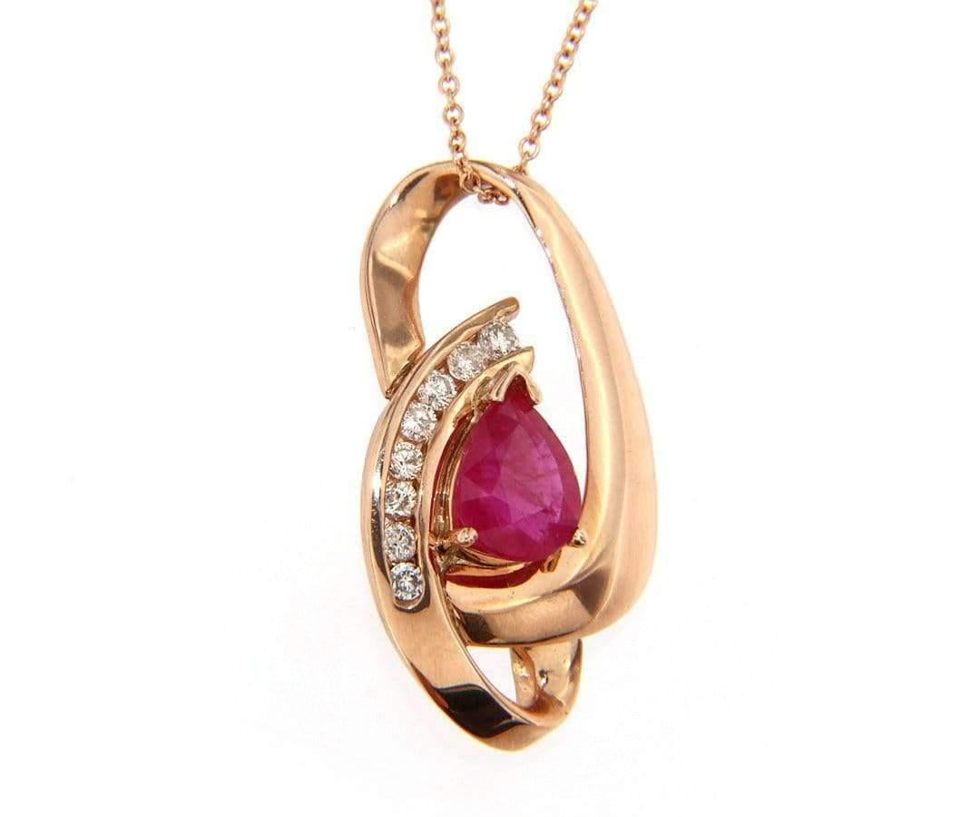 Fabulous Abstract Ruby & Diamond Interlocking Pendant Necklace in 14K

Ruby & Diamond Necklace
14K Rose Gold
Pear Shape Ruby
Diamond Weight: approx. 0.20 CTW
Pendant Size: approx. 5/8 X 1 1/8 Inches
Chain Length: 18 Inches
Weight: approx. 4.9