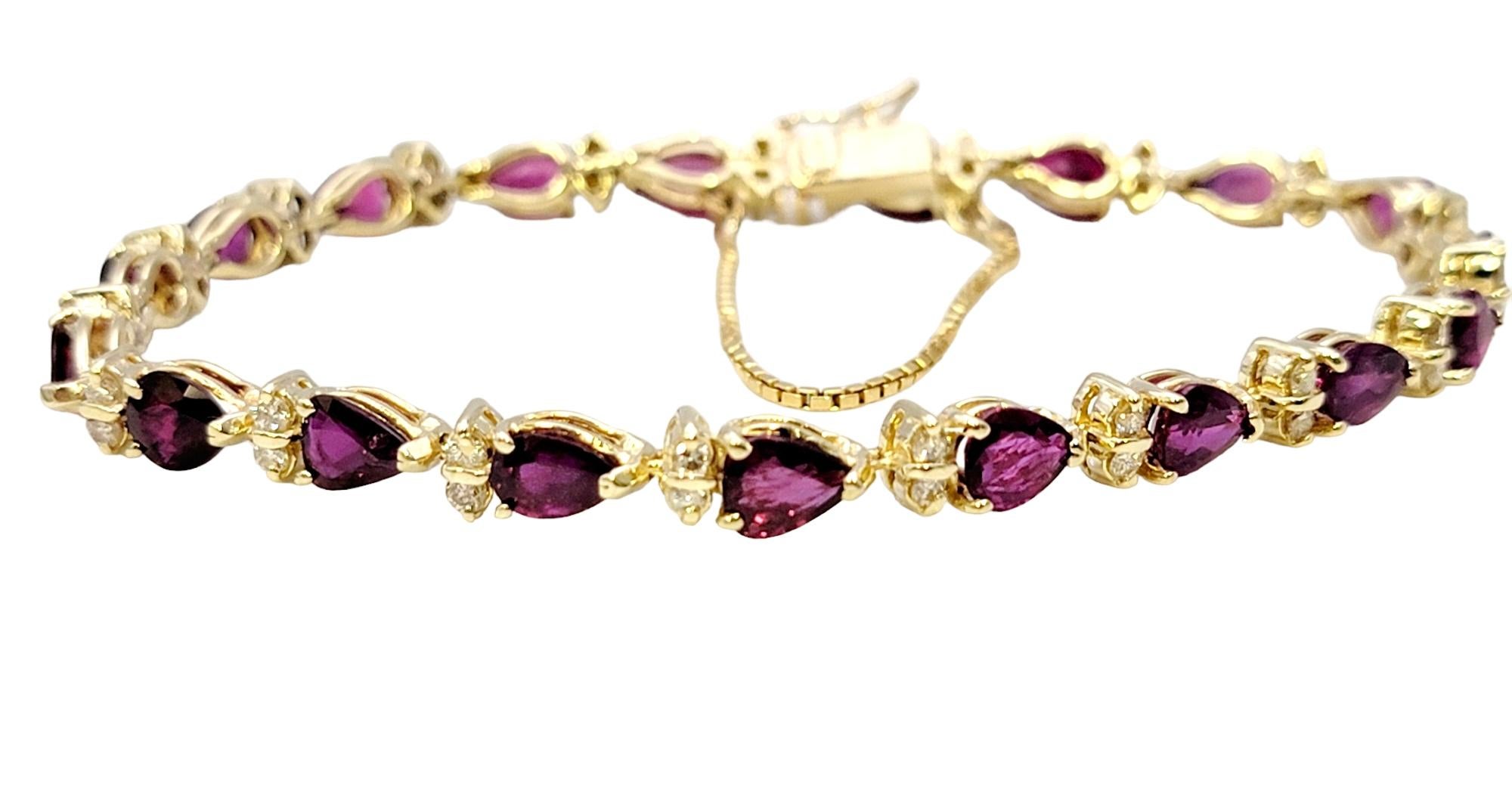Contemporary Pear Ruby and Round Diamond Station Line Bracelet in 14 Karat Yellow Gold