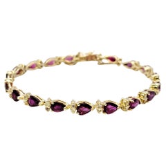 Pear Ruby and Round Diamond Station Line Bracelet in 14 Karat Yellow Gold