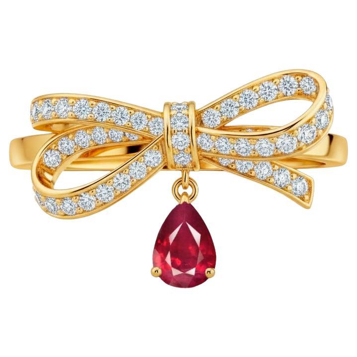 For Sale:  Pear ruby drop bow ring in 14k gold