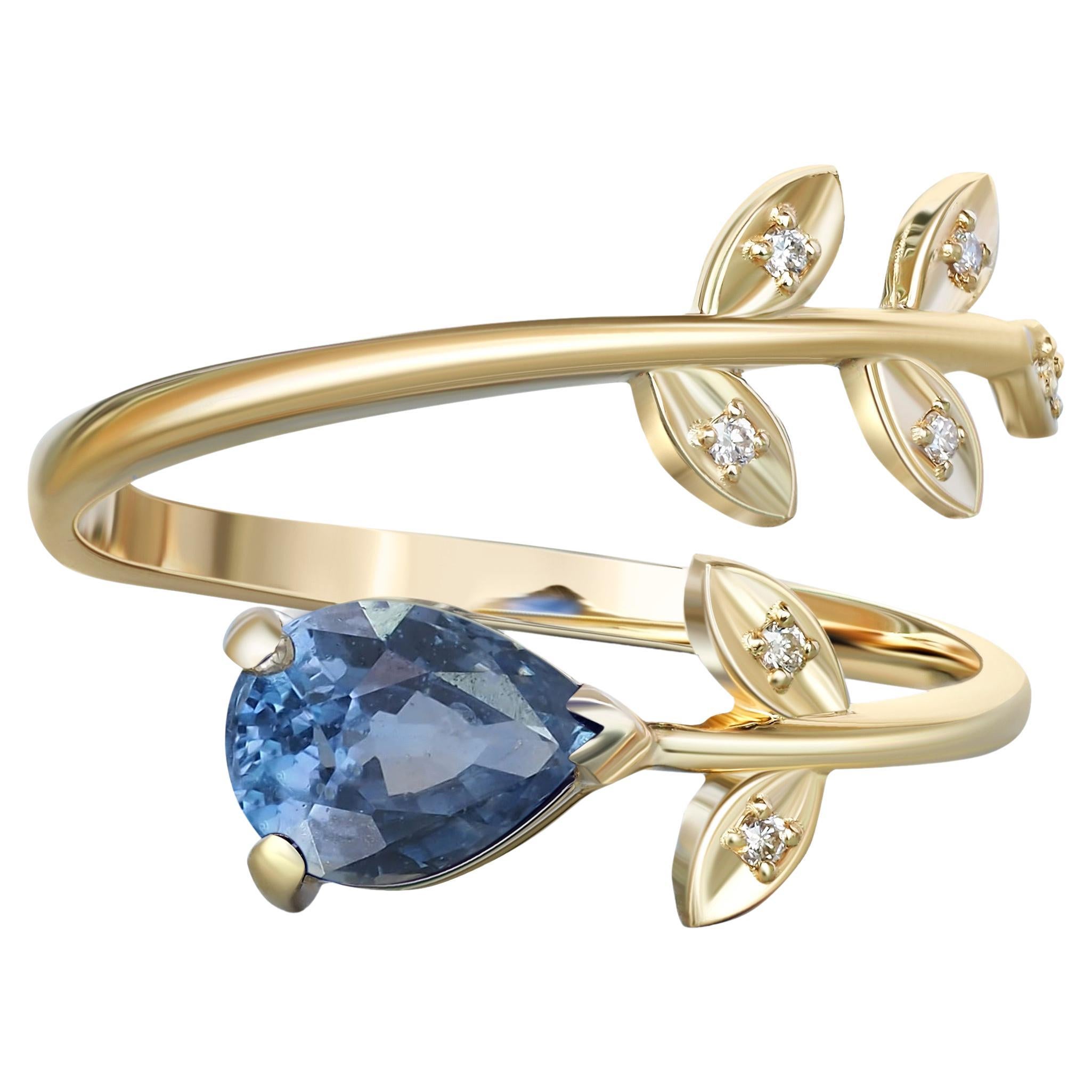 Bague en or 14k avec saphir en forme de poire. Bague en or avec saphir bleu.