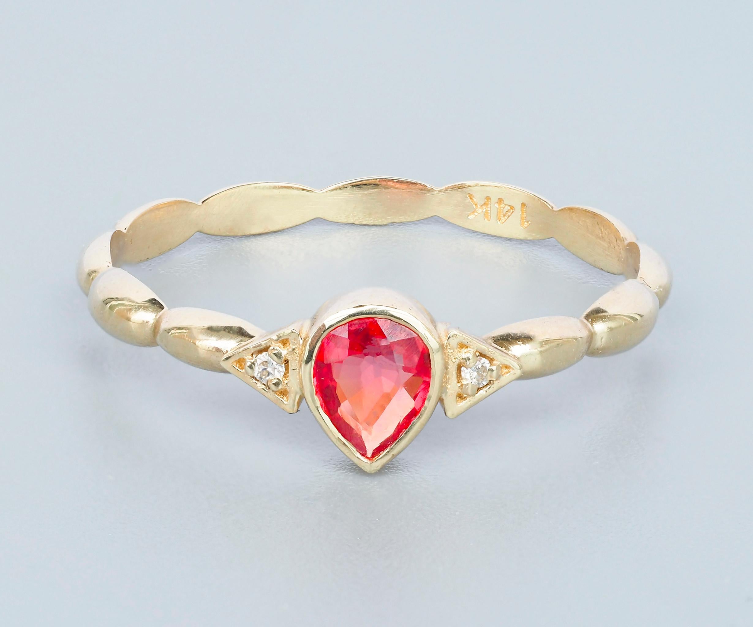 Modern Pear sapphire 14k gold ring. 