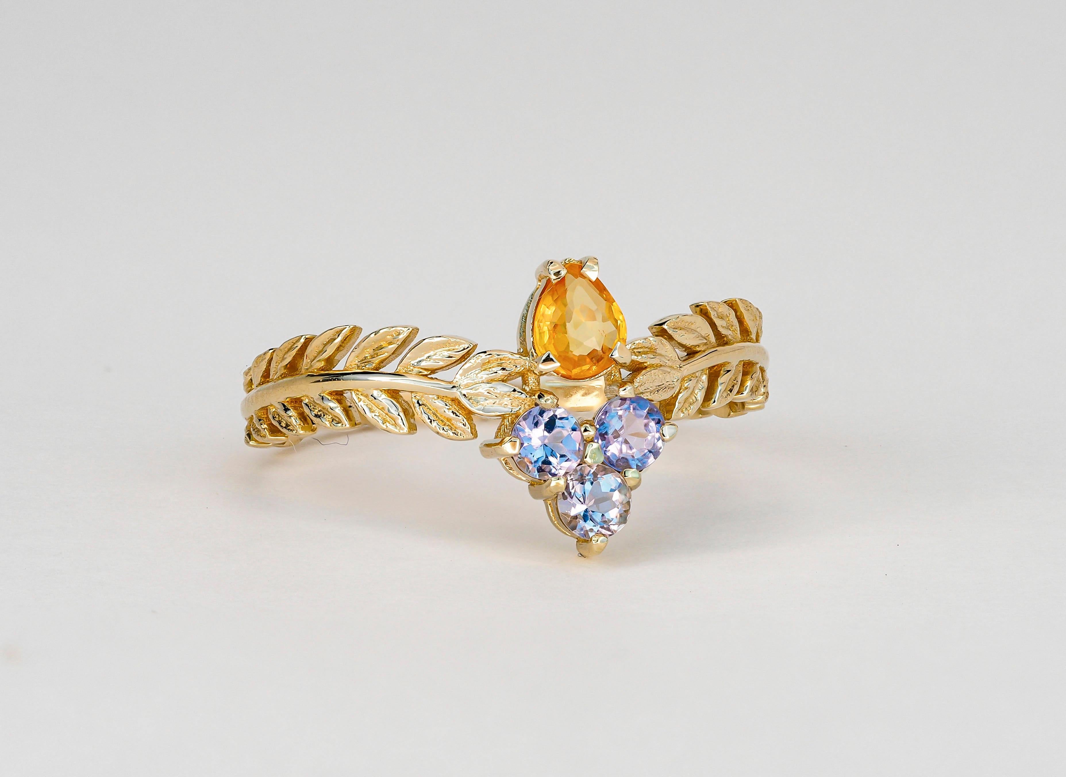 Modern Pear sapphire 14k gold ring.  For Sale