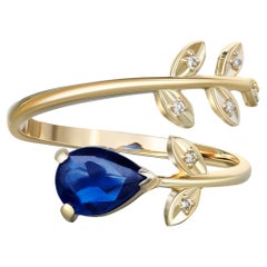 Pear sapphire 14k gold ring. 