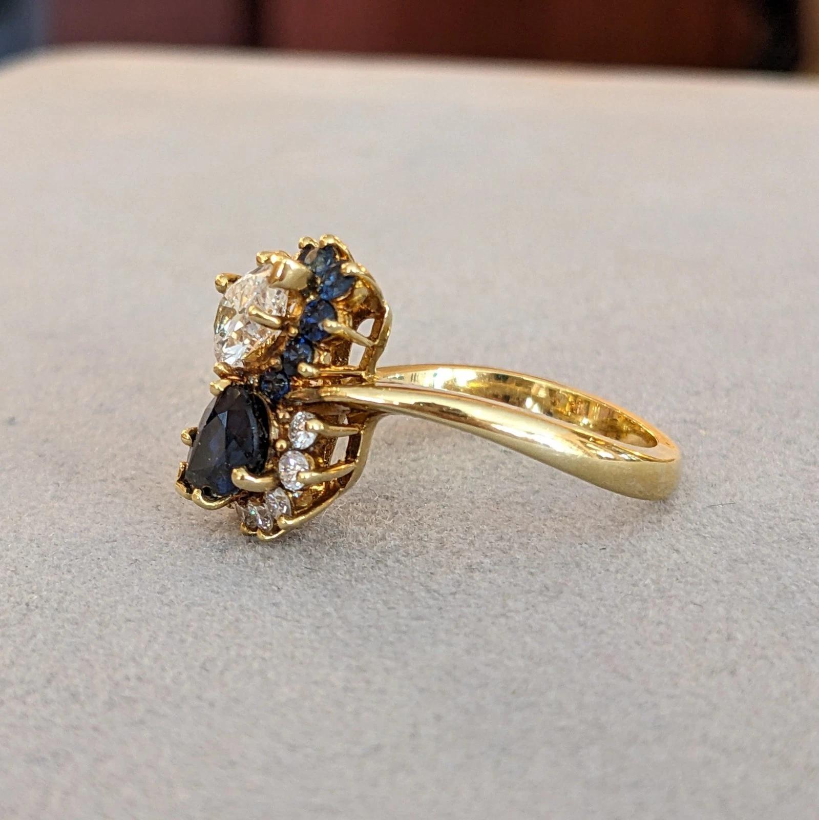 Donna Anello bypass con zaffiro e diamante perlato in oro giallo 18 carati in vendita