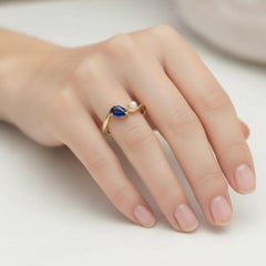 Pear sapphire and pearl 14k gold ring