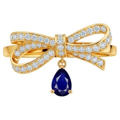 Pear sapphire drop bow ring in 14k gold Pear sapphire drop bow ring in 14k gold