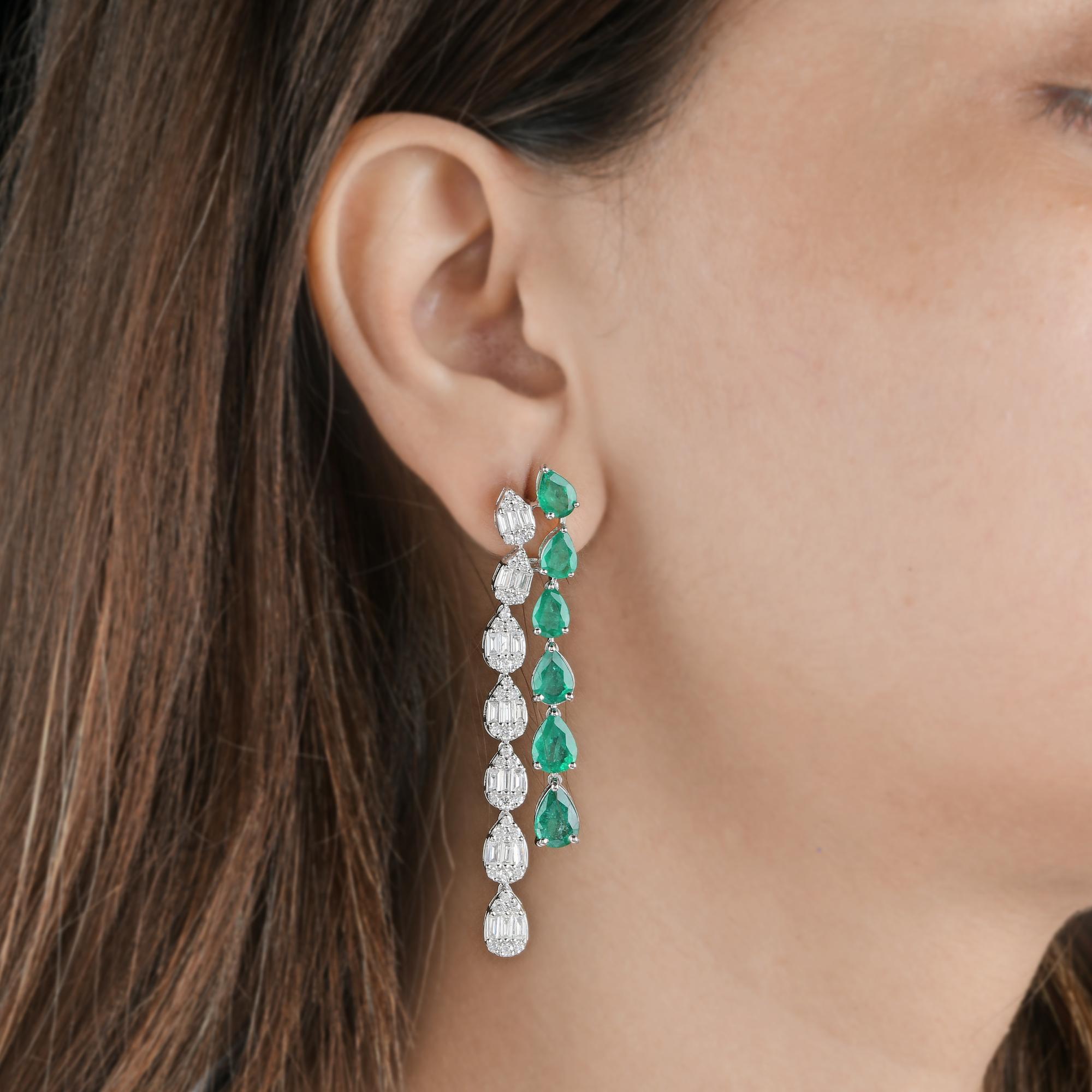 Pear Shape 13.06Tcw Zambian Emerald Diamond Dangle Drop Earrings 14K White Gold.
Emeralds are symbols of love, rebirth, and prosperity. Sourced from trusted mines, each emerald is hand-picked for its deep green color, natural clarity, and vibrant