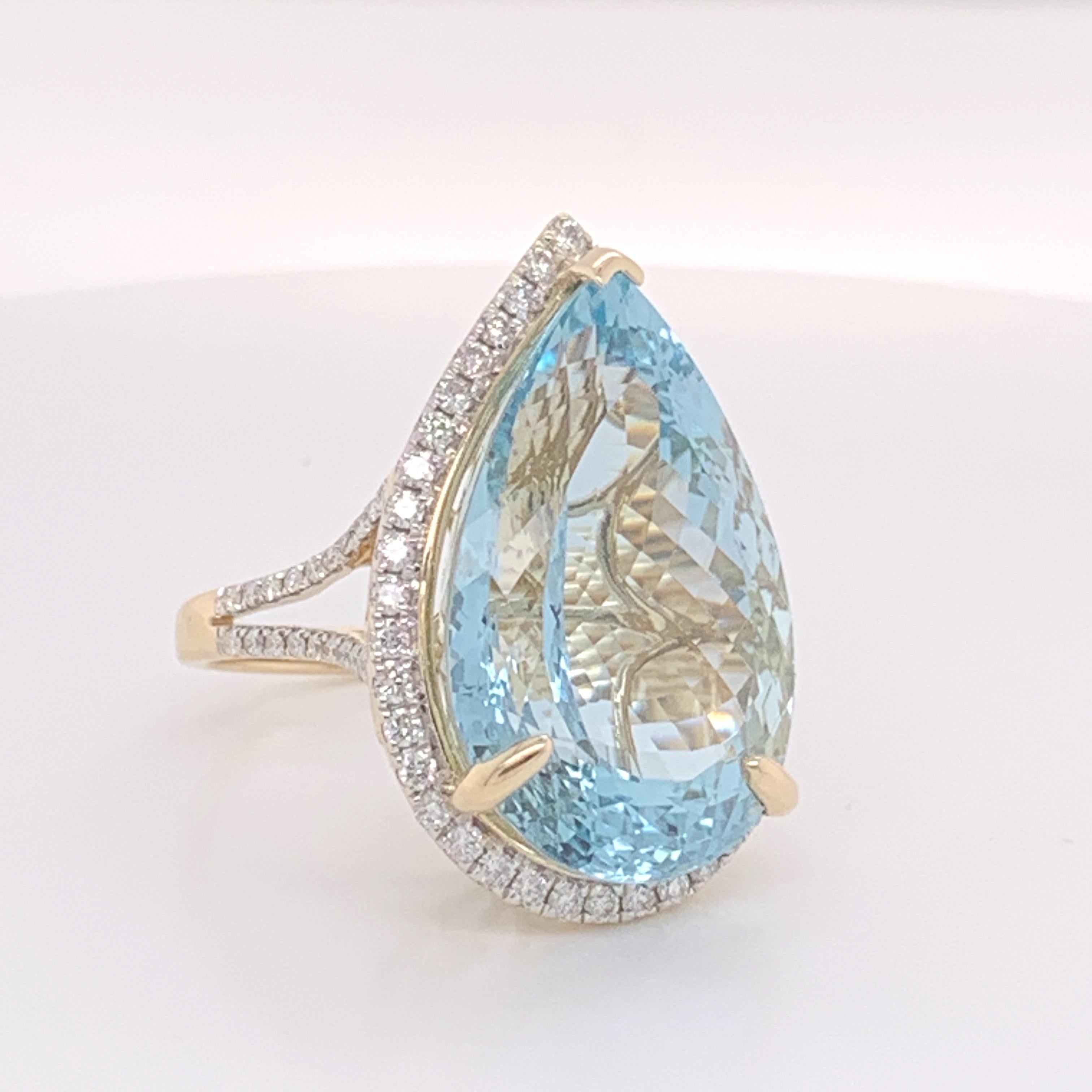 Natural Pear shape 26..71 Carat Aquamarine and 0.90 carat White Round Diamond ring set in 14 Karat Yellow Gold . The ring is Sizable 7. 

If you have any question or need additional photos do not hesitate to ask .