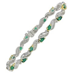 Pear Shape 5.0 Carat Colombian Emerald and Baguette Diamond White Gold Bracelet