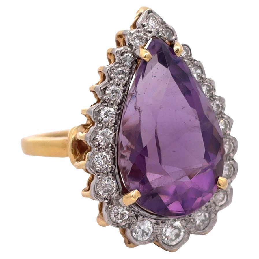 Anello con ametista e diamanti a forma di pera