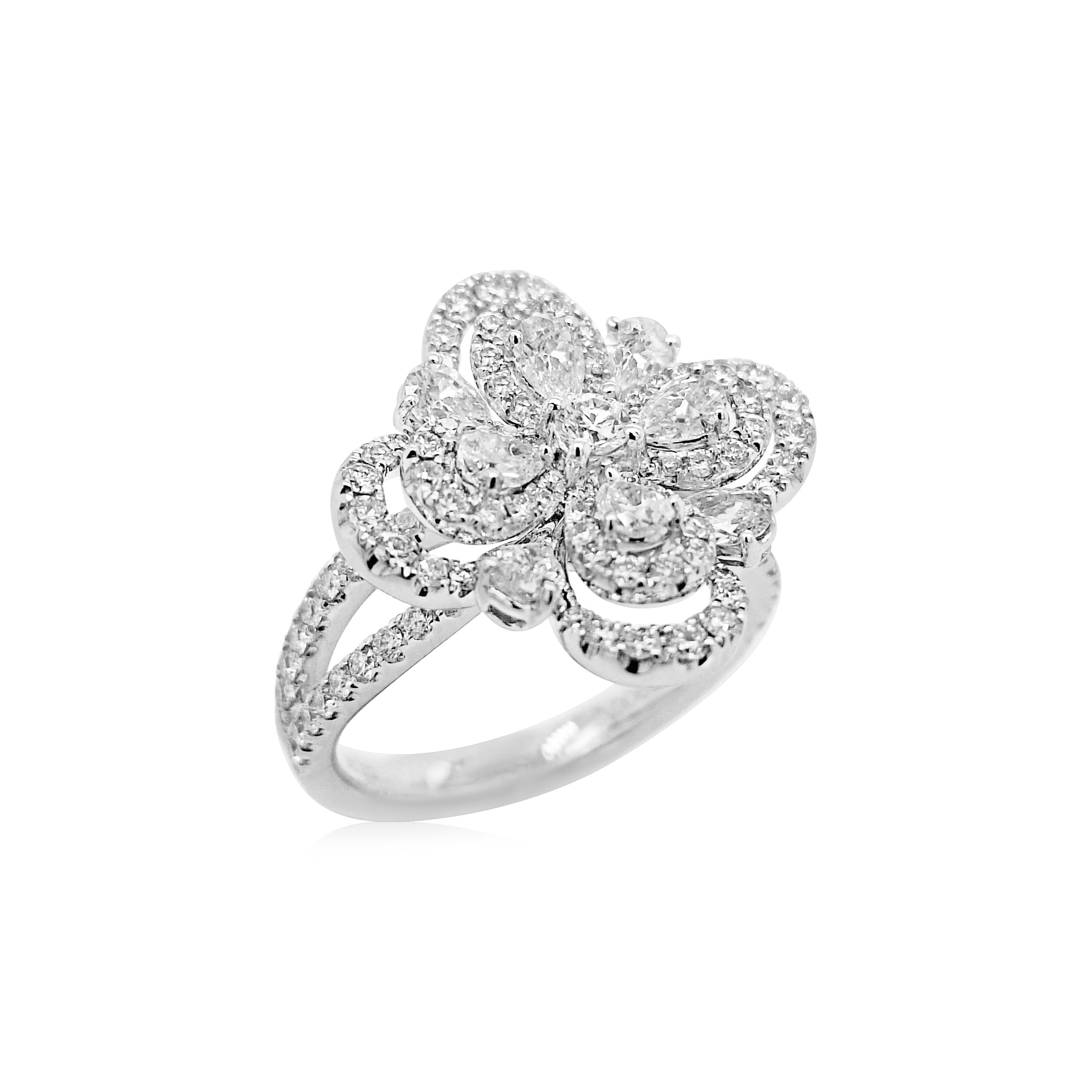 Art Deco Pear shape and Round Brilliant cut White Diamond Platinum Cocktail Ring For Sale