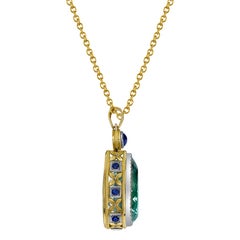 54.95 ct. Aquamarine Pear, Blue Sapphire, Yellow & White Gold Bezel Drop Pendant