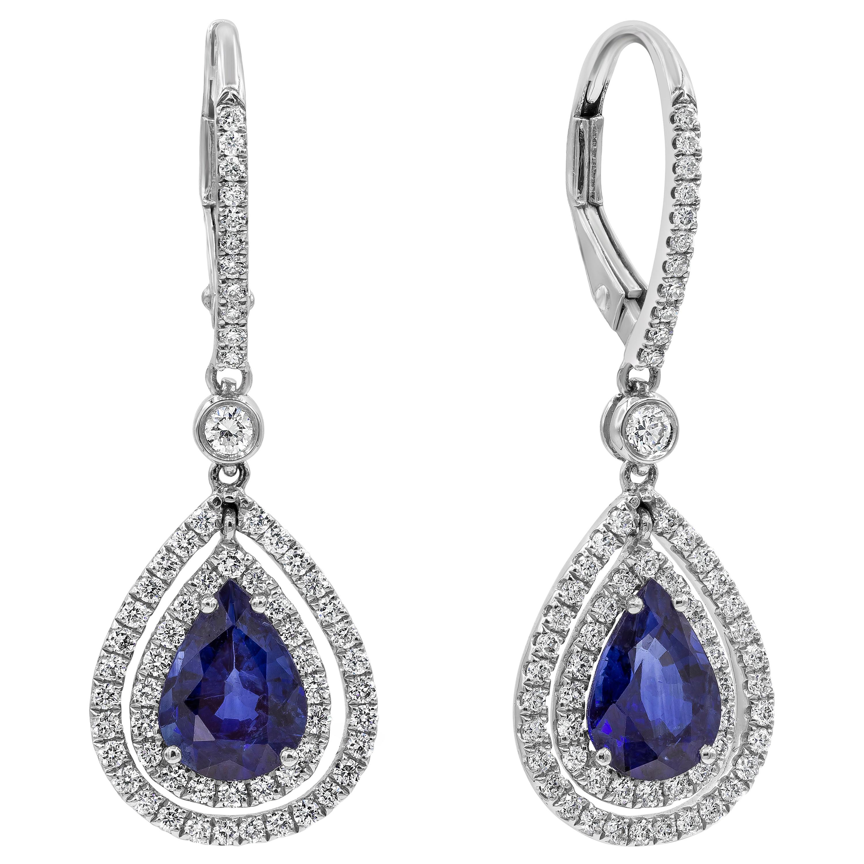 2.57 Carats Pear Shape Blue Sapphire with Diamond Double Halo Dangle Earrings For Sale