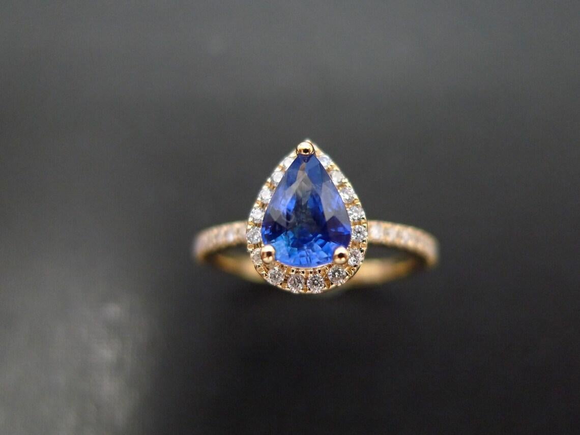 For Sale:  Pear Shape Blue Sapphire and Diamond Engagement Ring in 18K Yellow Gold 4