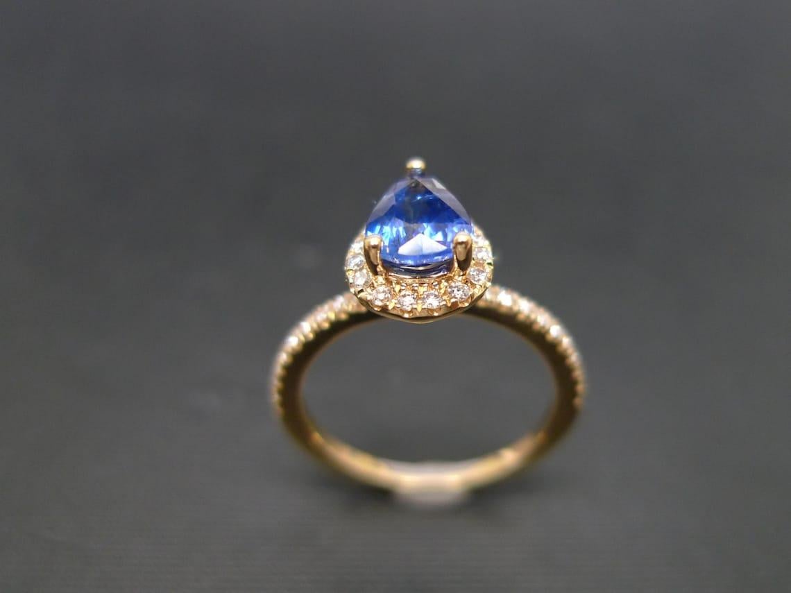 For Sale:  Pear Shape Blue Sapphire and Diamond Engagement Ring in 18K Yellow Gold 6