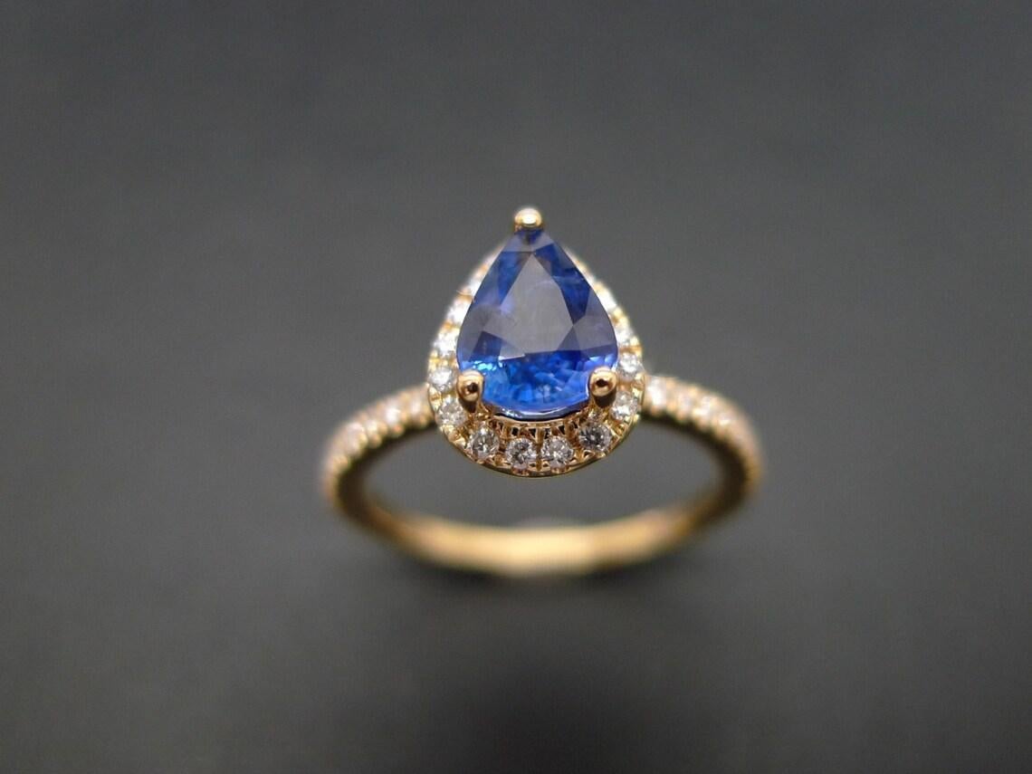 For Sale:  Pear Shape Blue Sapphire and Diamond Engagement Ring in 18K Yellow Gold 7