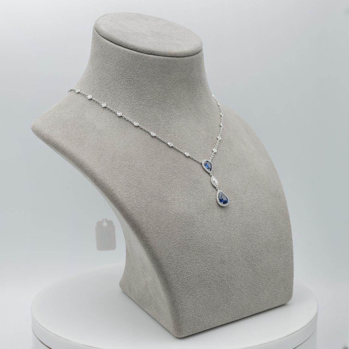 Contemporary Pear Shape Blue Sapphire and Diamond Halo Drop Pendant Necklace