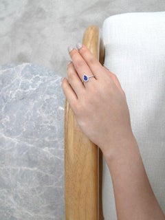 Pear Shape Blue Sapphire and Round Brilliant Cut Diamond Engagement Ring