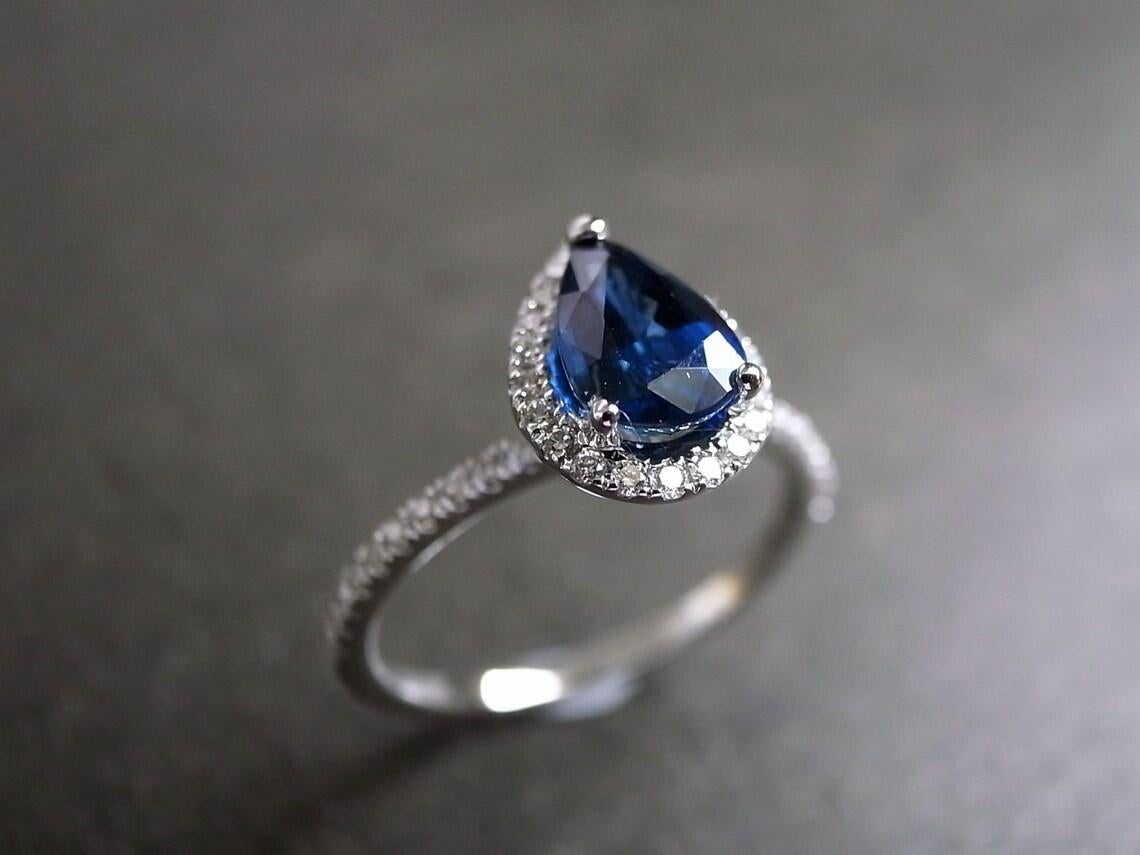For Sale:  Pear Shape Blue Sapphire and Round Brilliant Cut Diamond Engagement Ring  3
