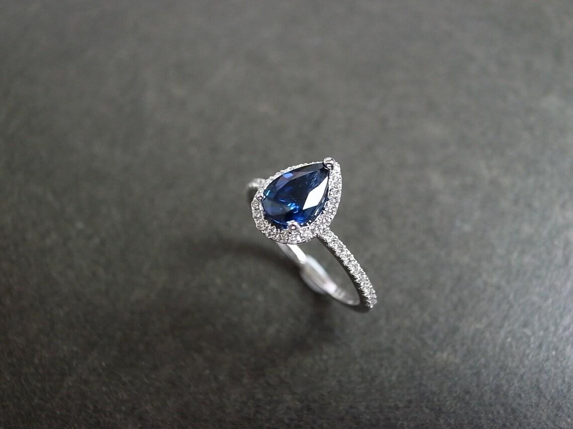 For Sale:  Pear Shape Blue Sapphire and Round Brilliant Cut Diamond Engagement Ring  5