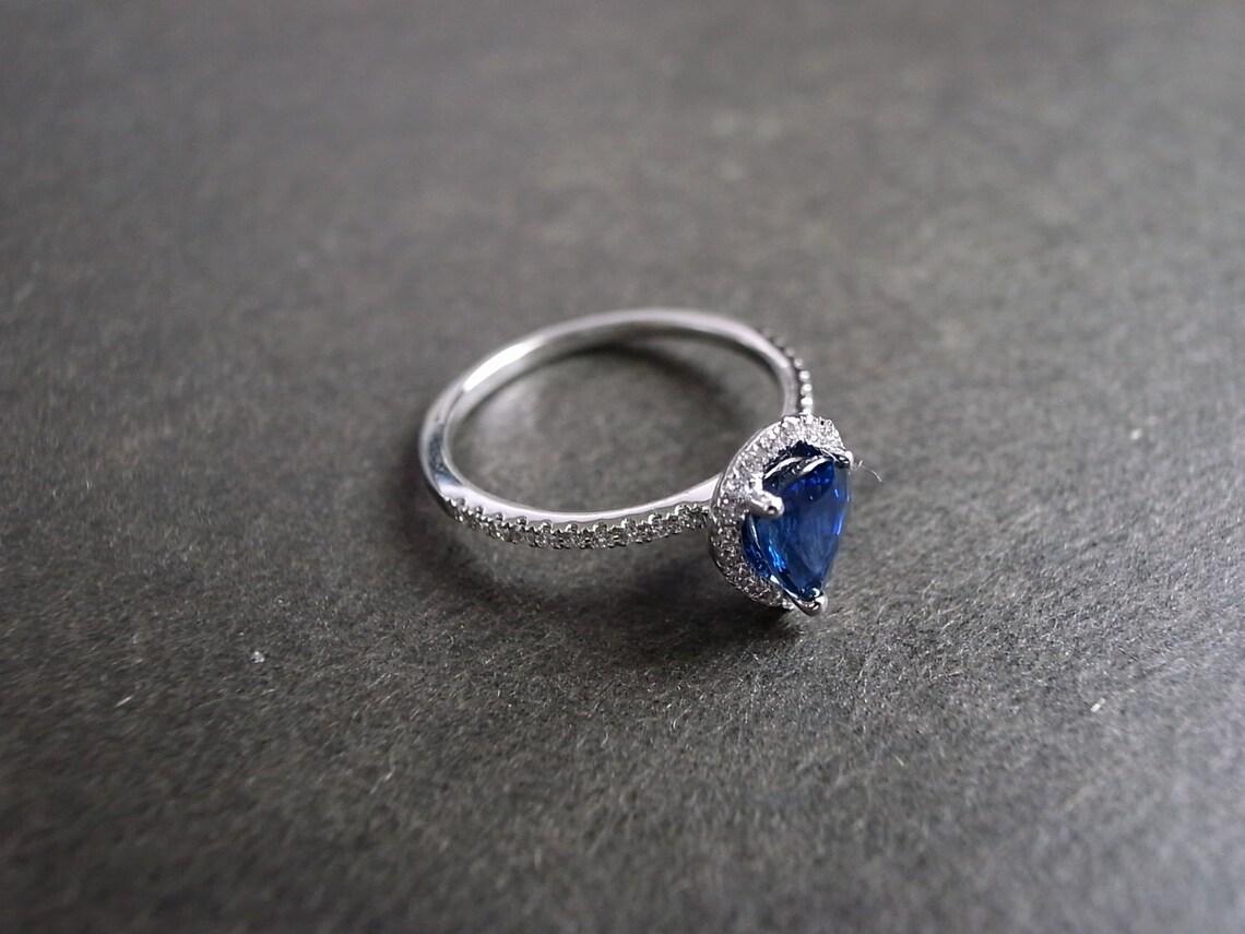 For Sale:  Pear Shape Blue Sapphire and Round Brilliant Cut Diamond Engagement Ring  6