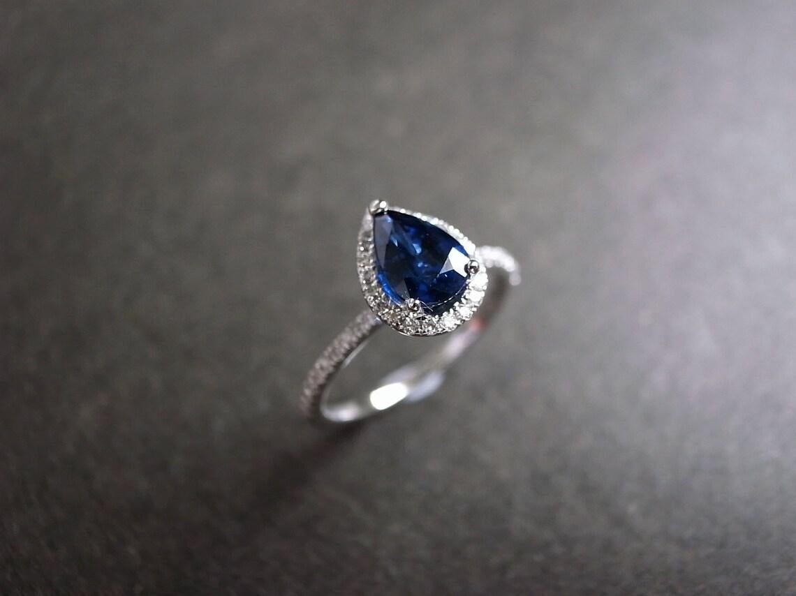 For Sale:  Pear Shape Blue Sapphire and Round Brilliant Cut Diamond Engagement Ring  7