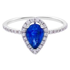 Bague de fiançailles en saphir bleu en forme de poire et diamant rond taille brillant