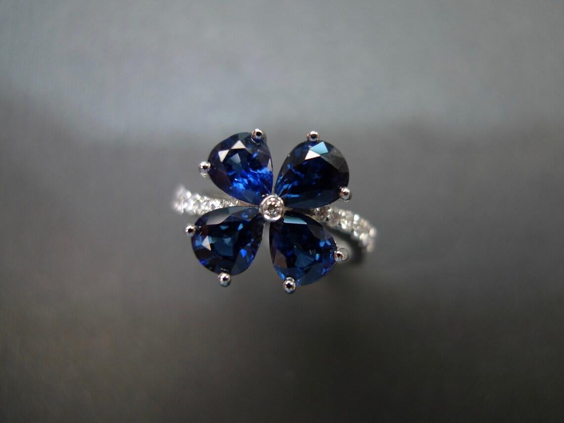 For Sale:  Pear Shape Blue Sapphire Diamond Twist Tension Style Floral Engagement Ring 4