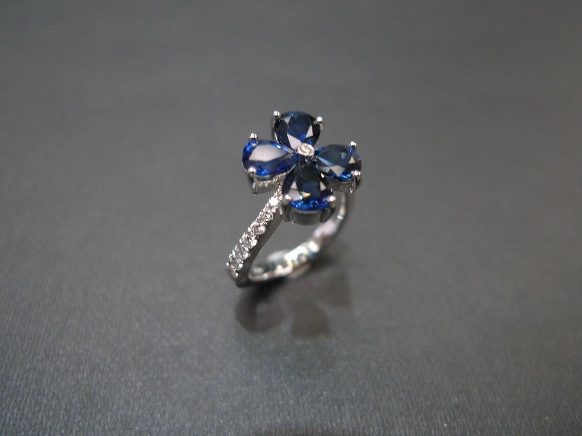 For Sale:  Pear Shape Blue Sapphire Diamond Twist Tension Style Floral Engagement Ring 5