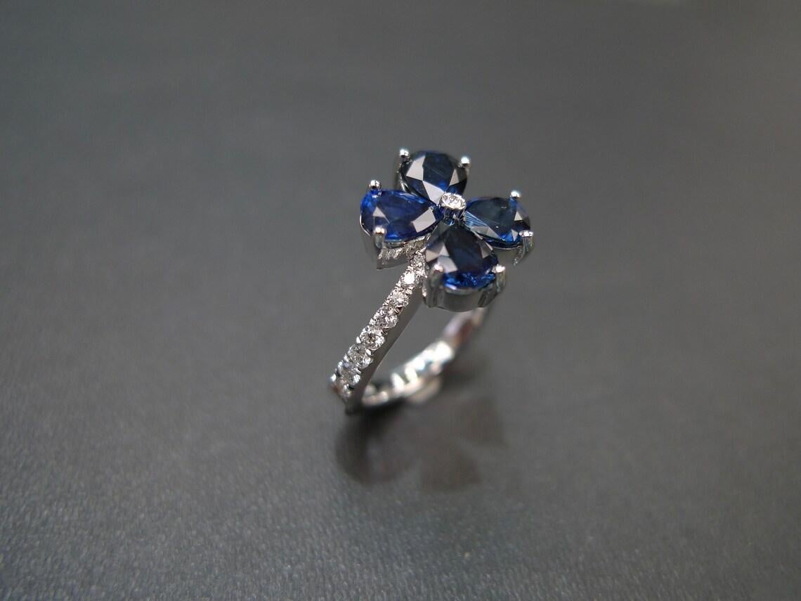 For Sale:  Pear Shape Blue Sapphire Diamond Twist Tension Style Floral Engagement Ring 6