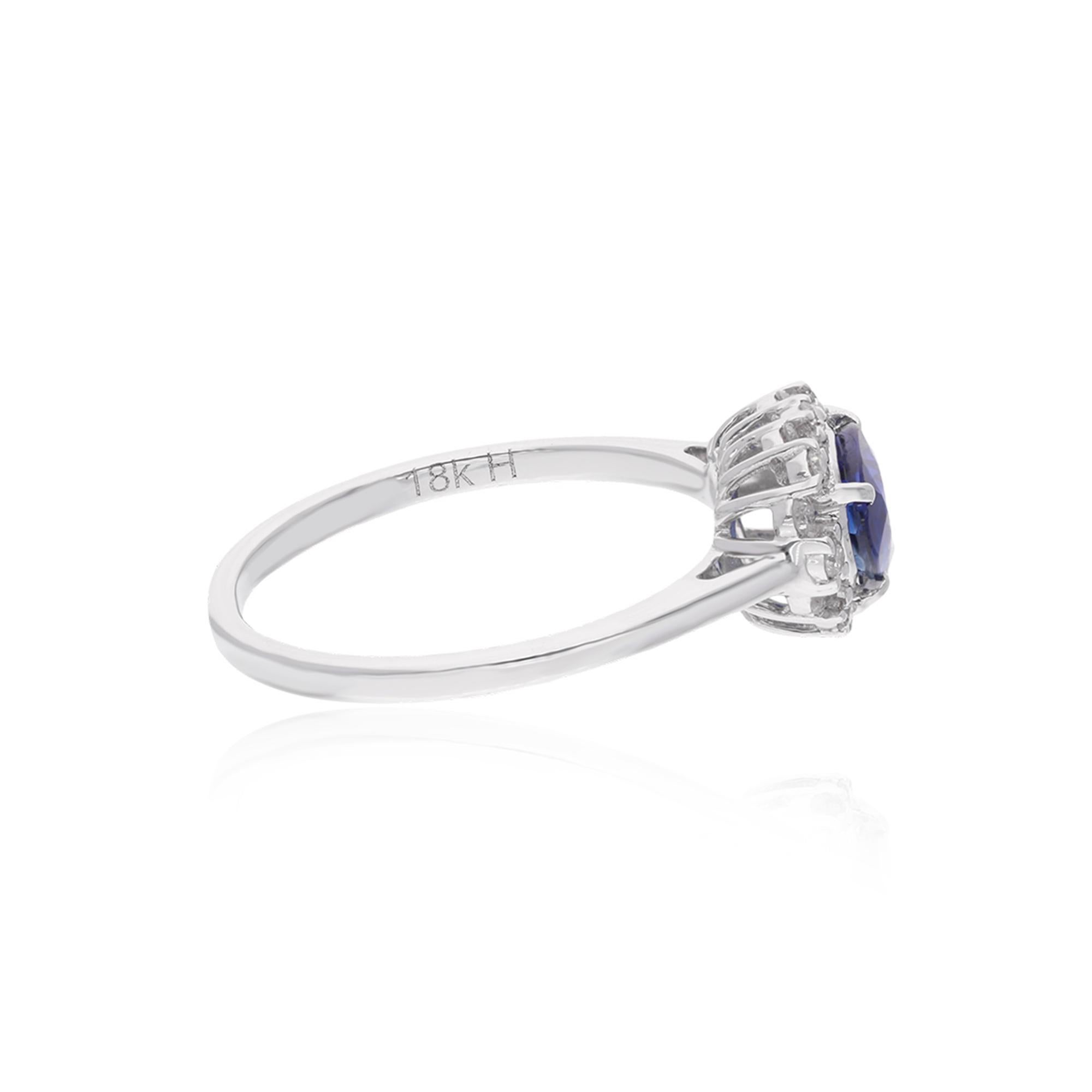Cast from 14-karat gold, these exquisite ring is handset with 1.20 carats blue sapphire and 0.18 carats of sparkling diamonds.

The ring is a size 7 US and may be resized to larger or smaller upon request. FOLLOW SPECTRUM JEWELS storefront to view