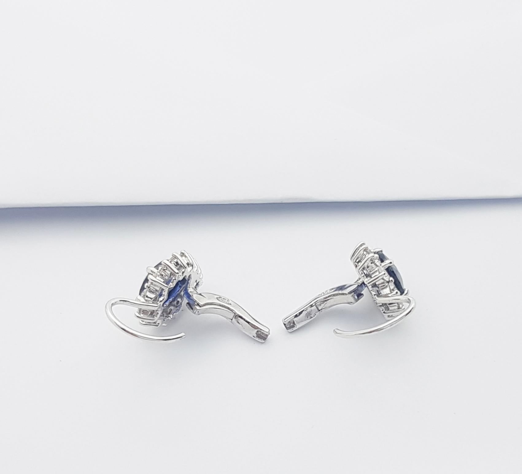 Contemporary Pear Shape Blue Sapphire with Diamond Earrings Set in 18k White Gold Settings For Sale