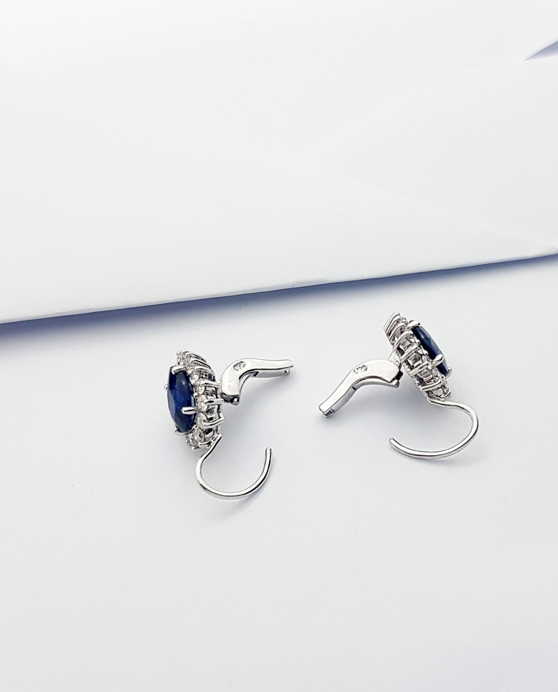 Pear Cut Pear Shape Blue Sapphire with Diamond Earrings Set in 18k White Gold Settings For Sale
