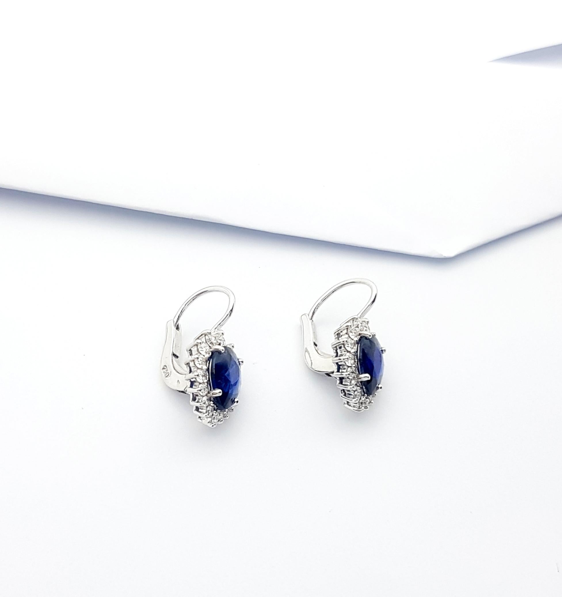 Women's Pear Shape Blue Sapphire with Diamond Earrings Set in 18k White Gold Settings For Sale