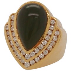 Vintage Pear Shape Cabochon Cut Onyx and Diamond Ladies Ring 18 Karat Yellow Gold