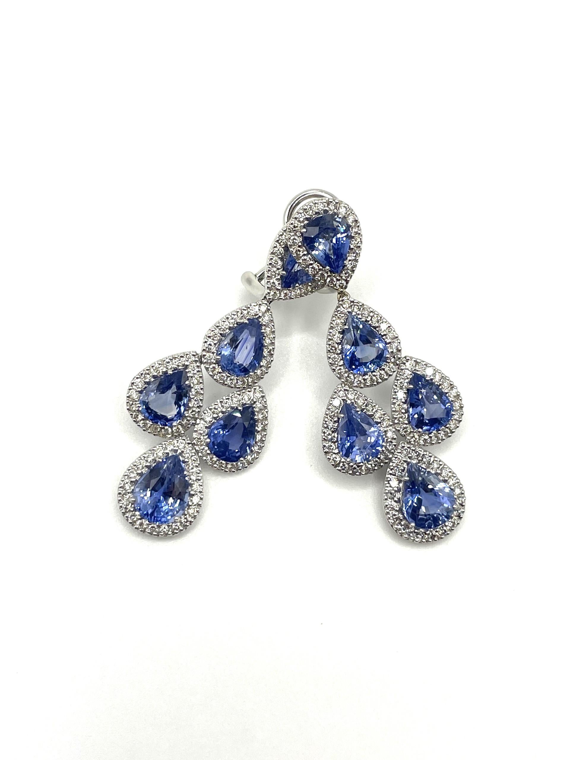 A pair of 18kt white gold pear shape chandelier earrings set with natural pear shape Ceylon blue sapphires and white diamonds with straight post and omega clip system. Add an elegant touch to any special occasion!

10 natural pear shape Ceylon blue