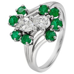 1.05 Carats Total Pear Shape Diamond and Emerald Cut Green Emerald Fashion Ring